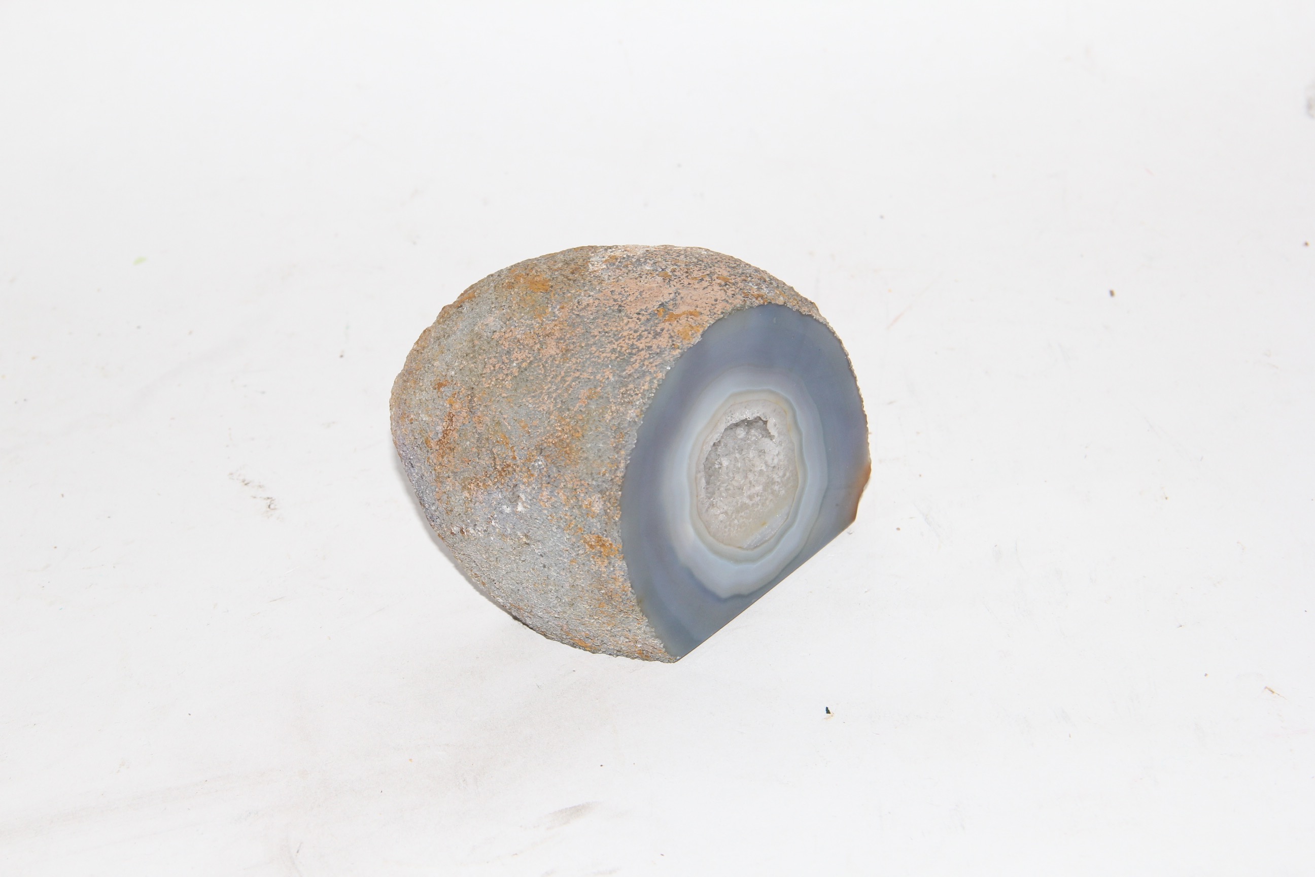 Pair of Geodes and Painted Stone