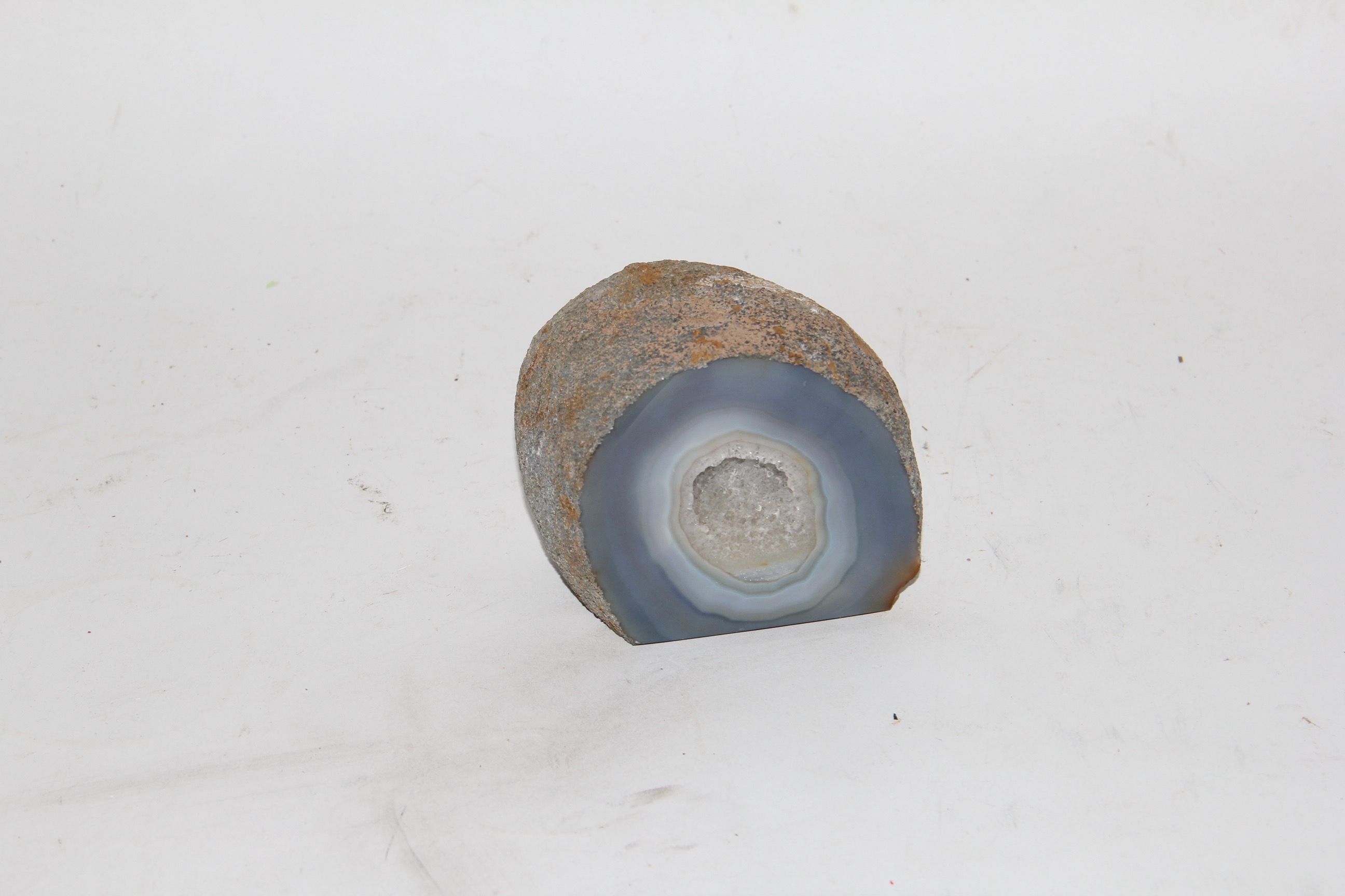 Pair of Geodes and Painted Stone