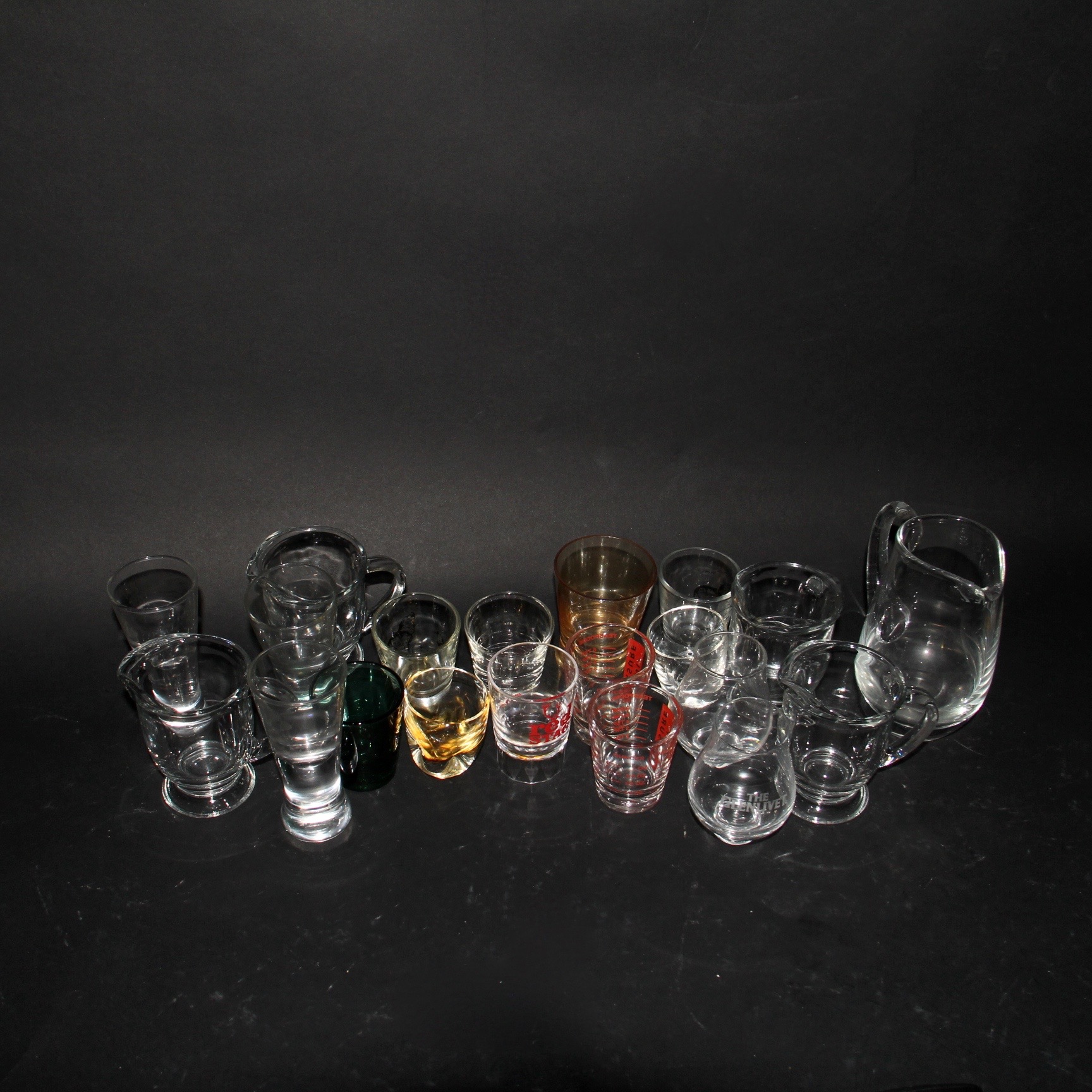 Assortment of Shot Glasses and Pourers