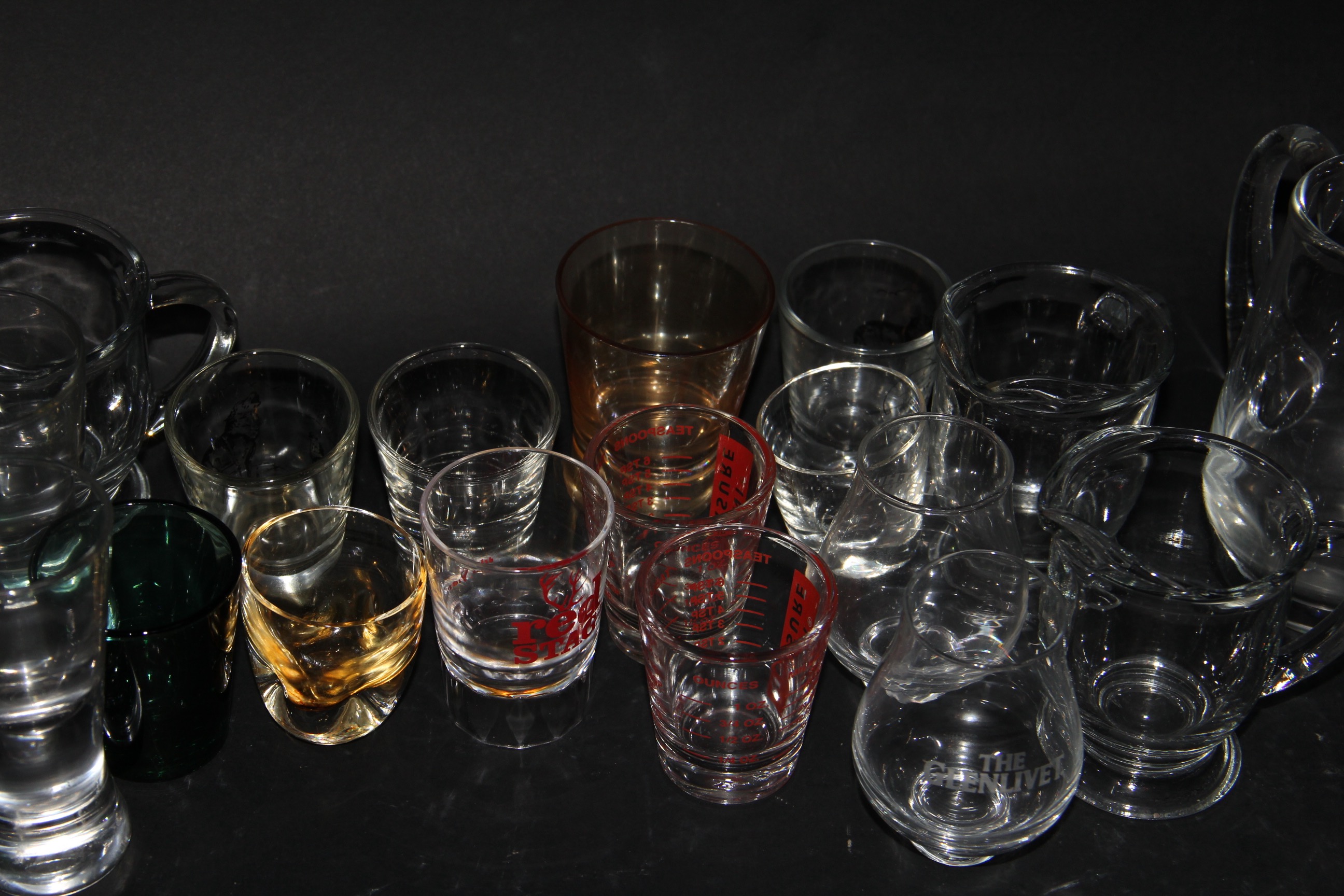 Assortment of Shot Glasses and Pourers