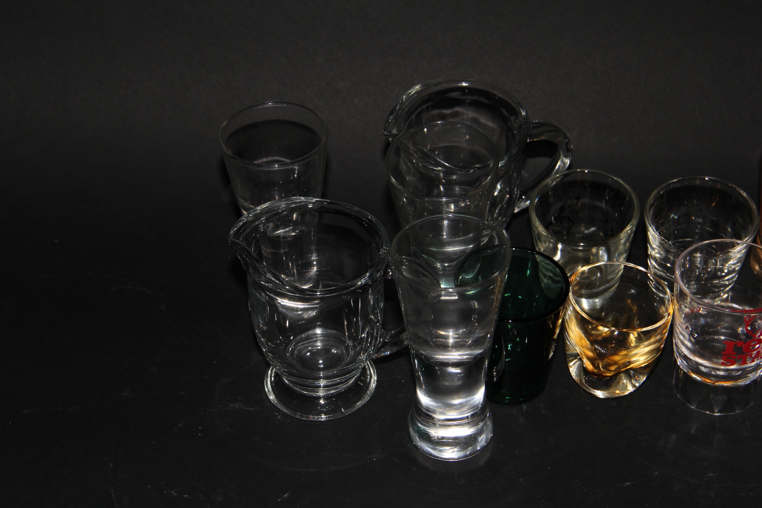 Assortment of Shot Glasses and Pourers