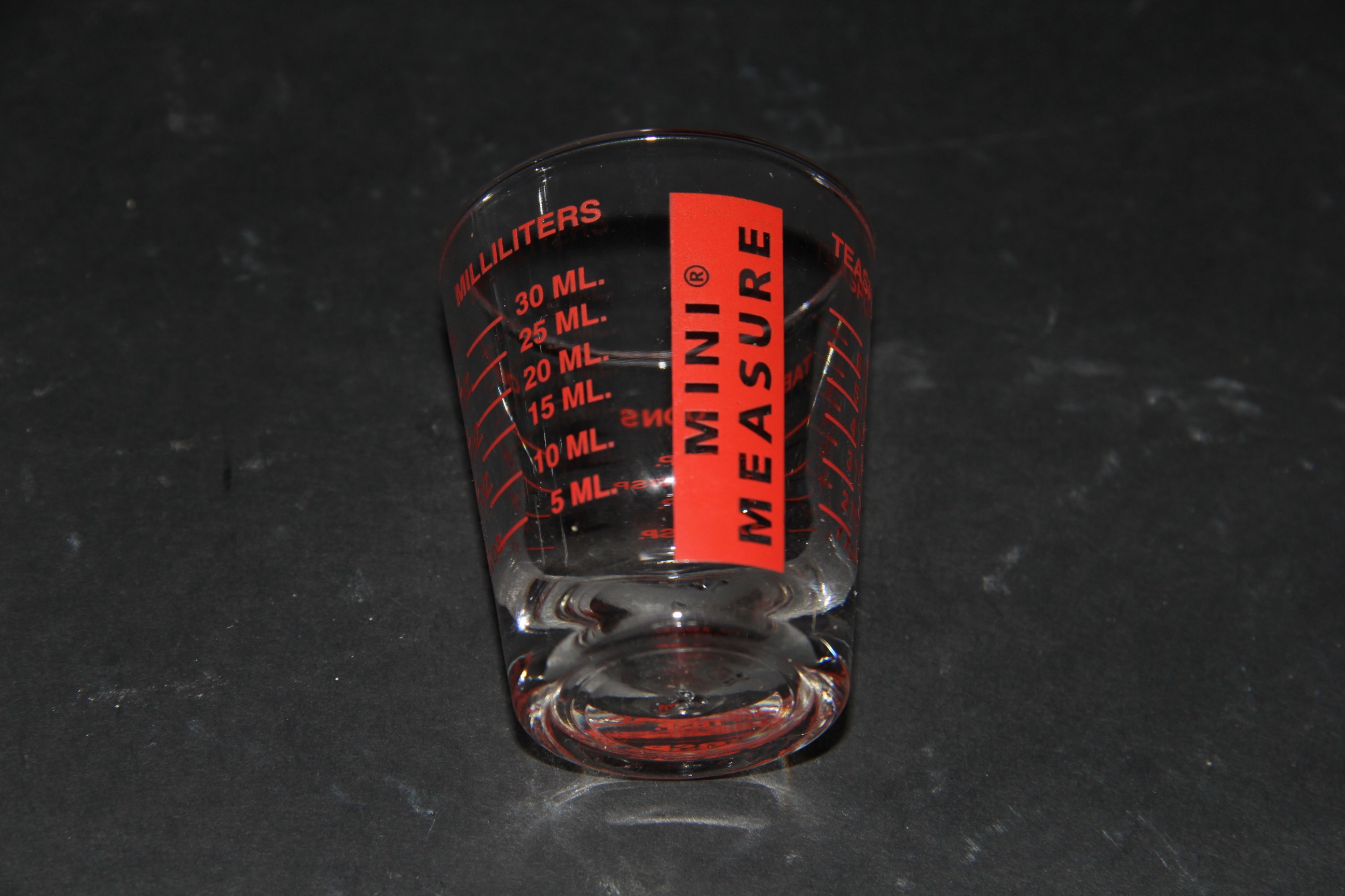 Assortment of Shot Glasses and Pourers