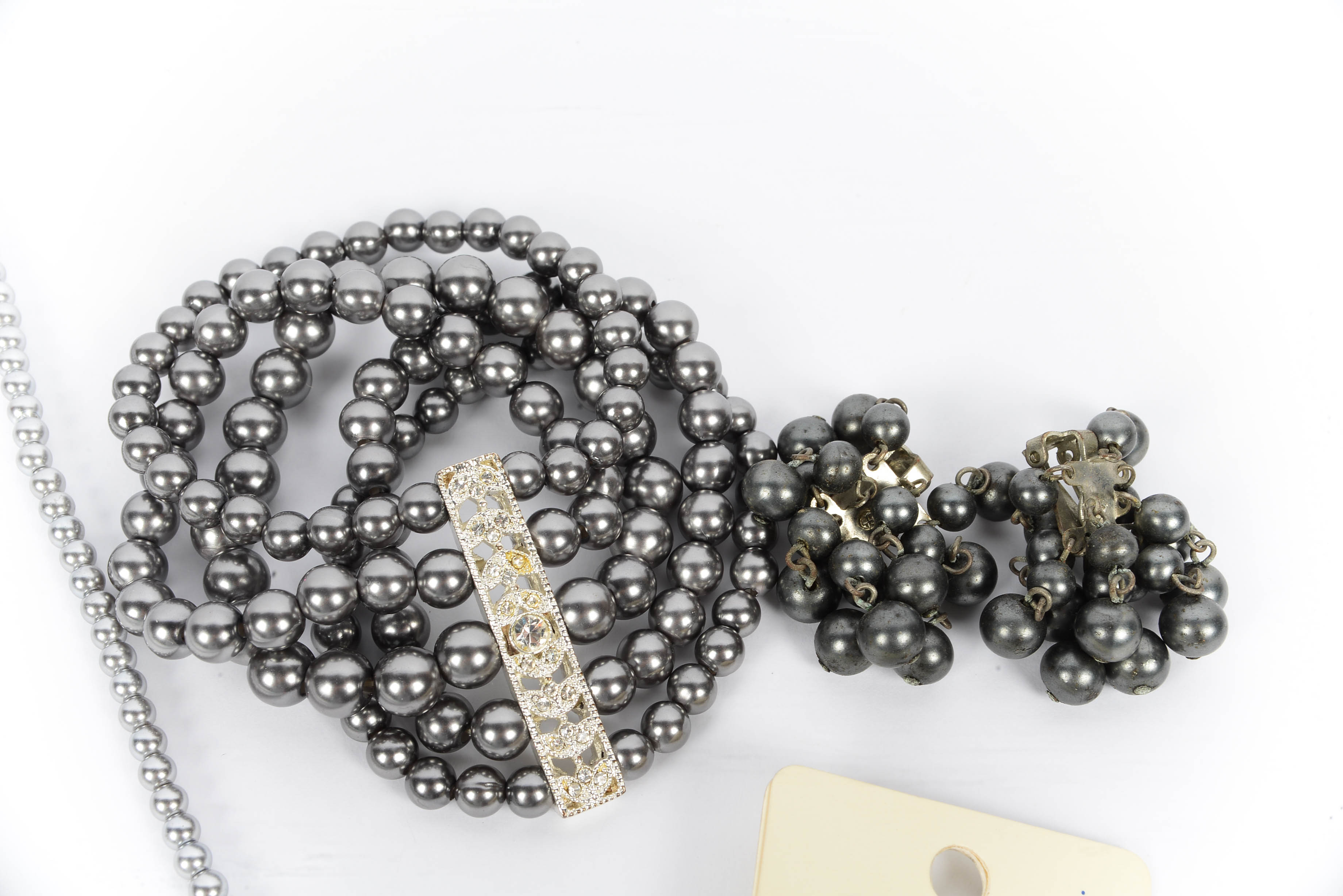 Grouping of Grey Hued Jewelry