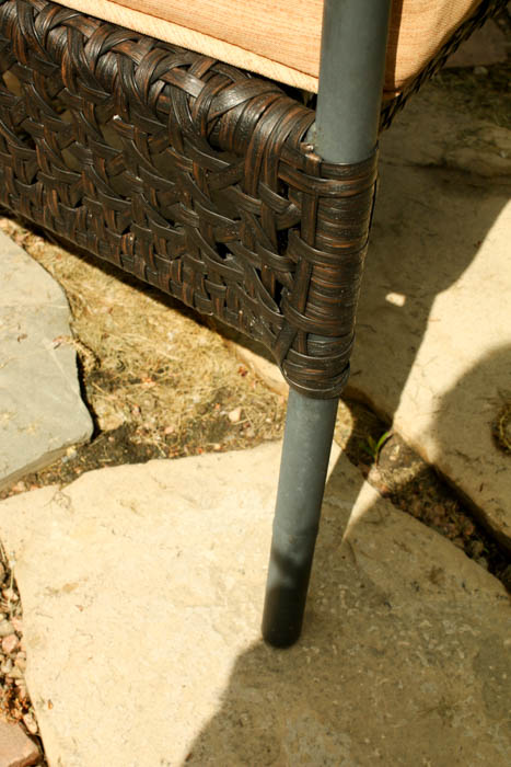 Four Wicker Wrapped Patio Armchairs and Glass Top Side Table