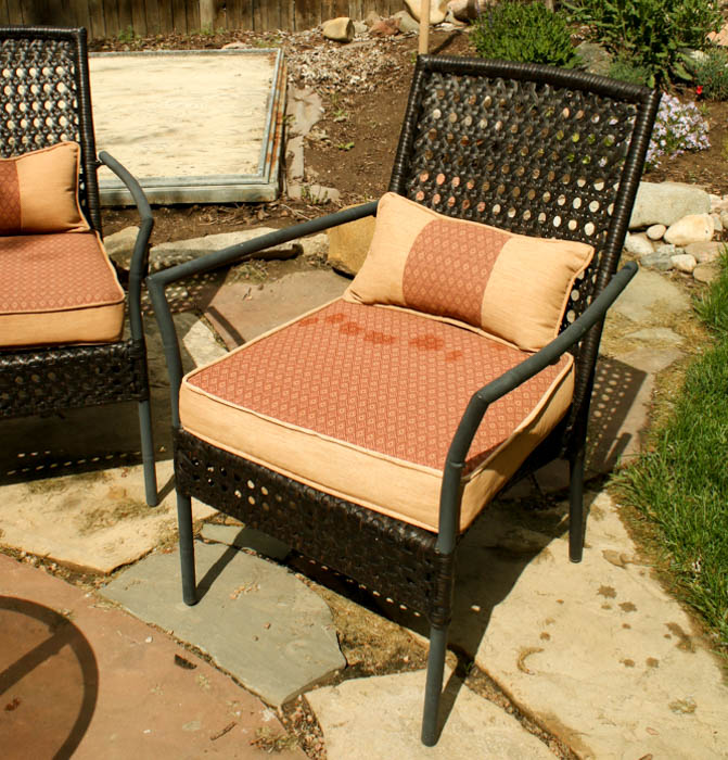 Four Wicker Wrapped Patio Armchairs and Glass Top Side Table