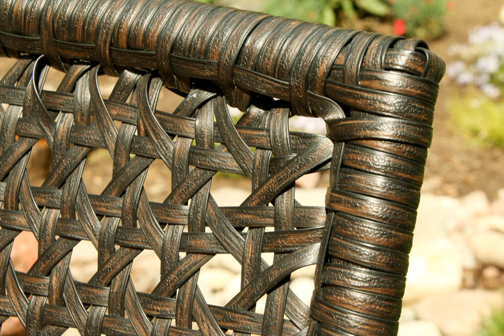 Four Wicker Wrapped Patio Armchairs and Glass Top Side Table