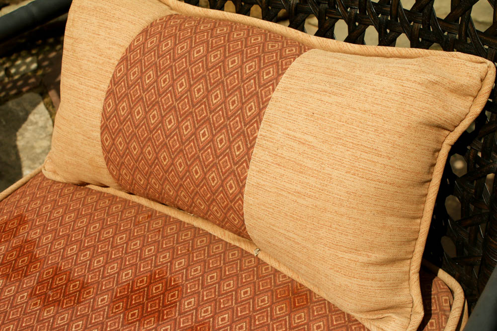 Four Wicker Wrapped Patio Armchairs and Glass Top Side Table