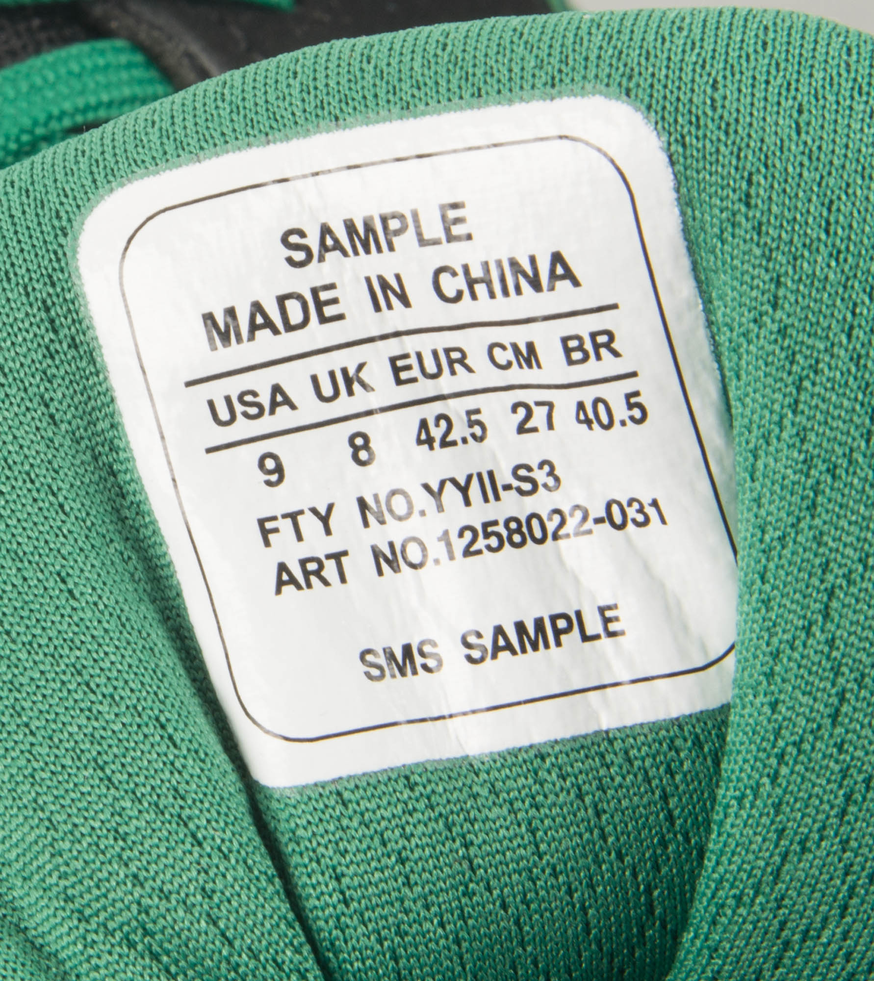 Green Under Armour Football Cleats