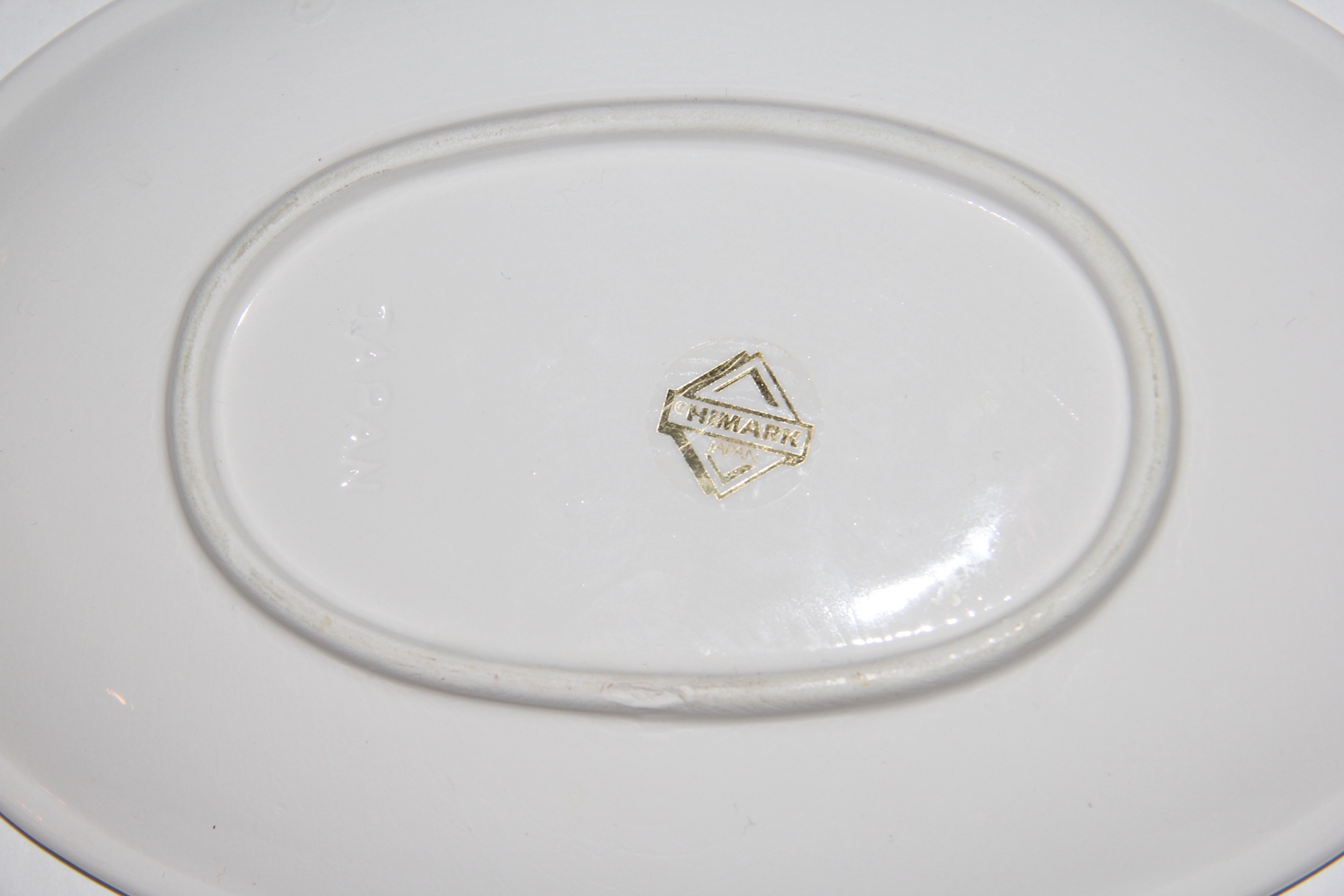 World Market White Ceramic Bowls and a Himark Gravy Boat