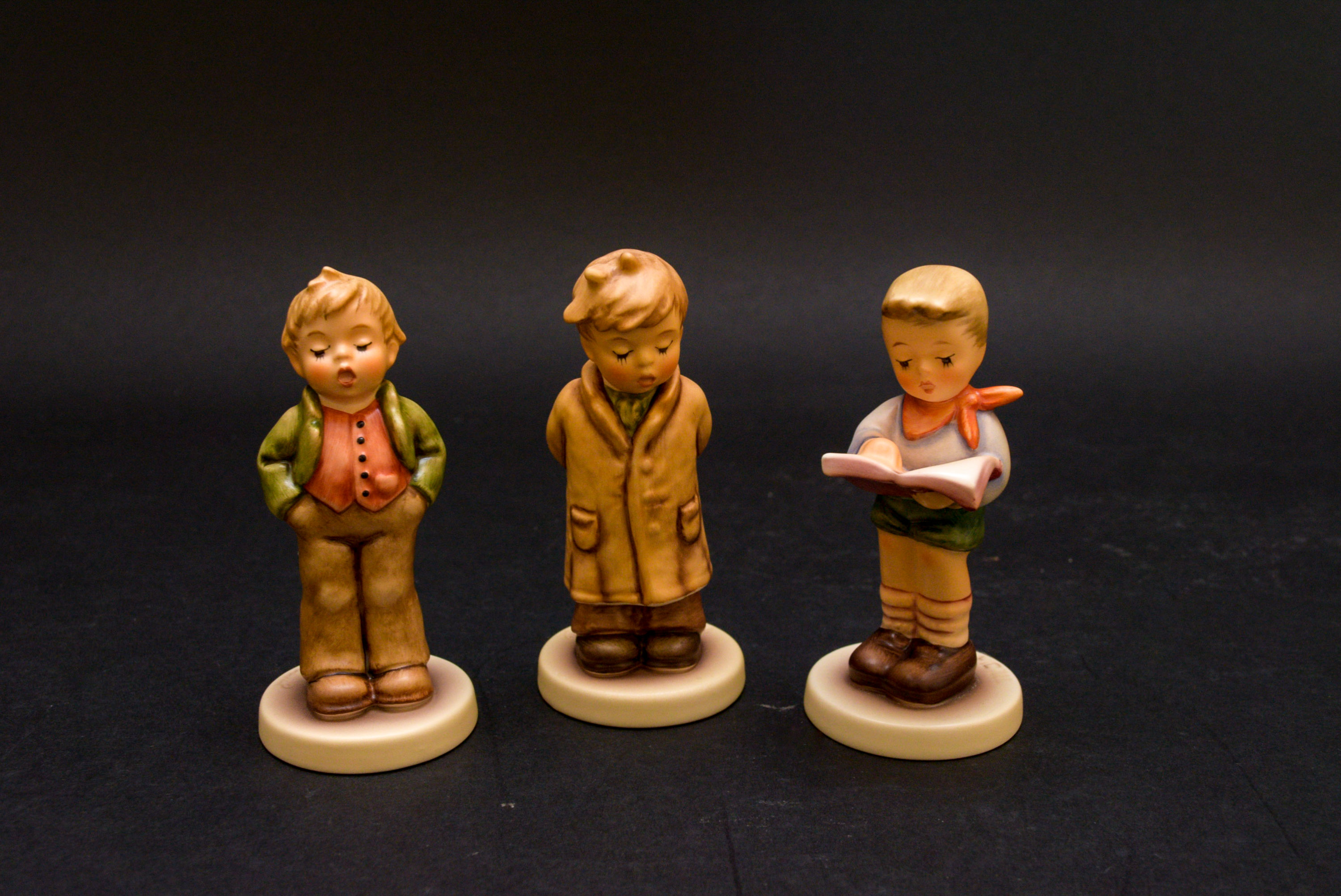 "Too Shy To Sing," "Honor Student" and "Sted Fast Suprano" Hummel Figurines