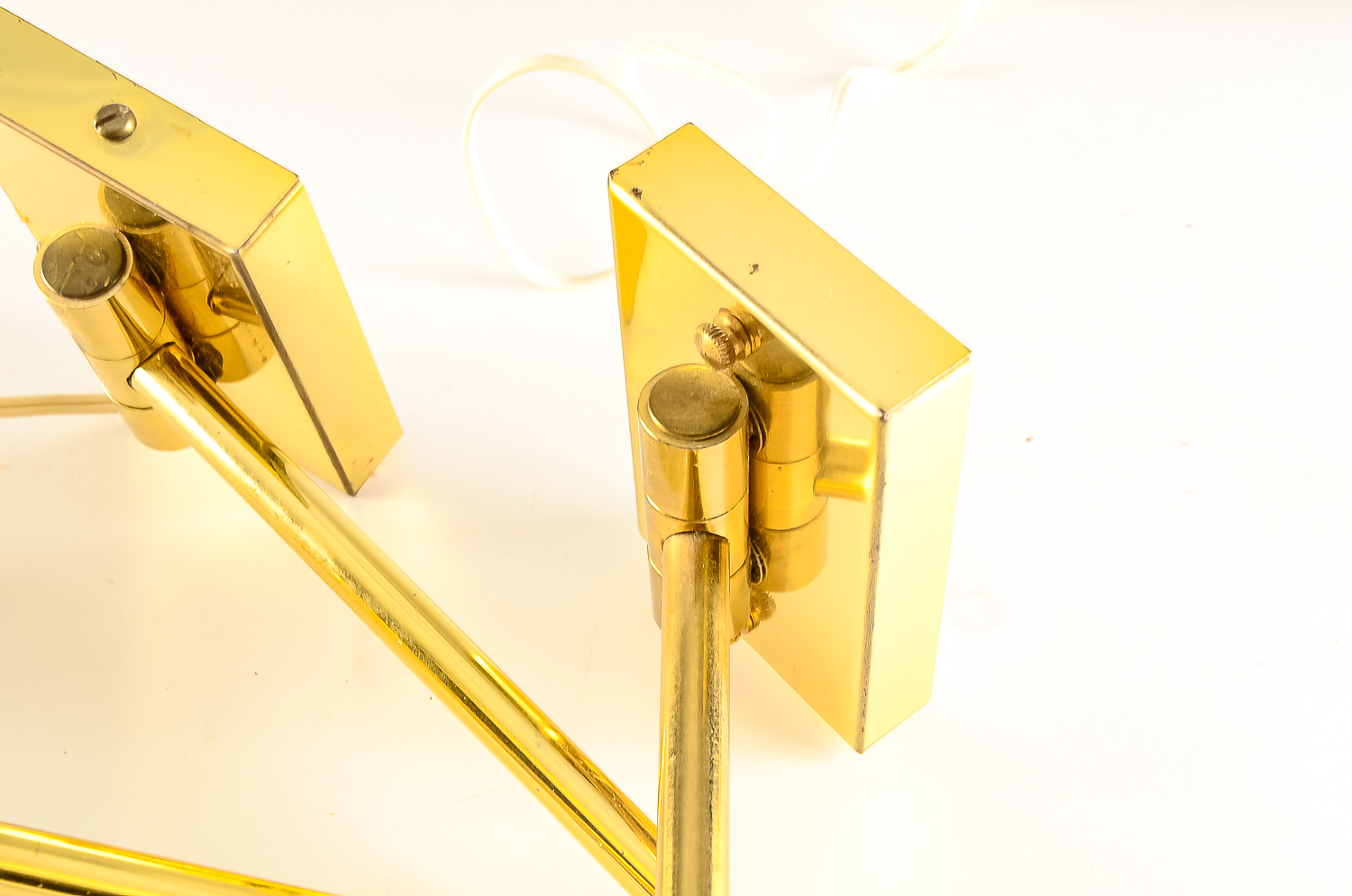Matching Pair of Brass Swing-Arm Lamps