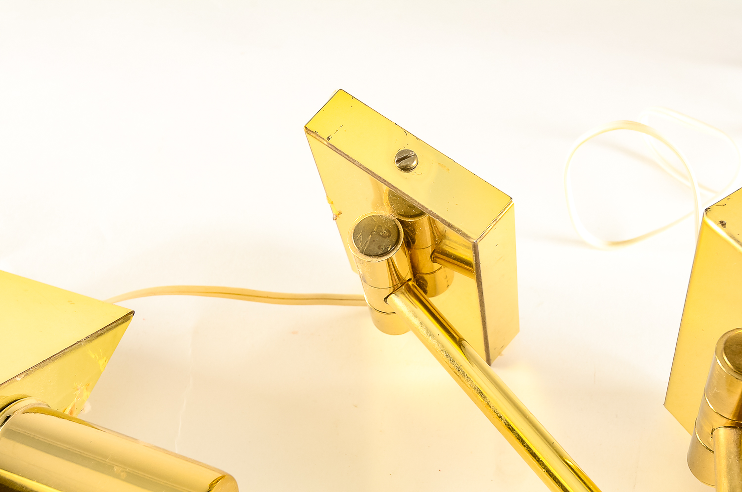 Matching Pair of Brass Swing-Arm Lamps