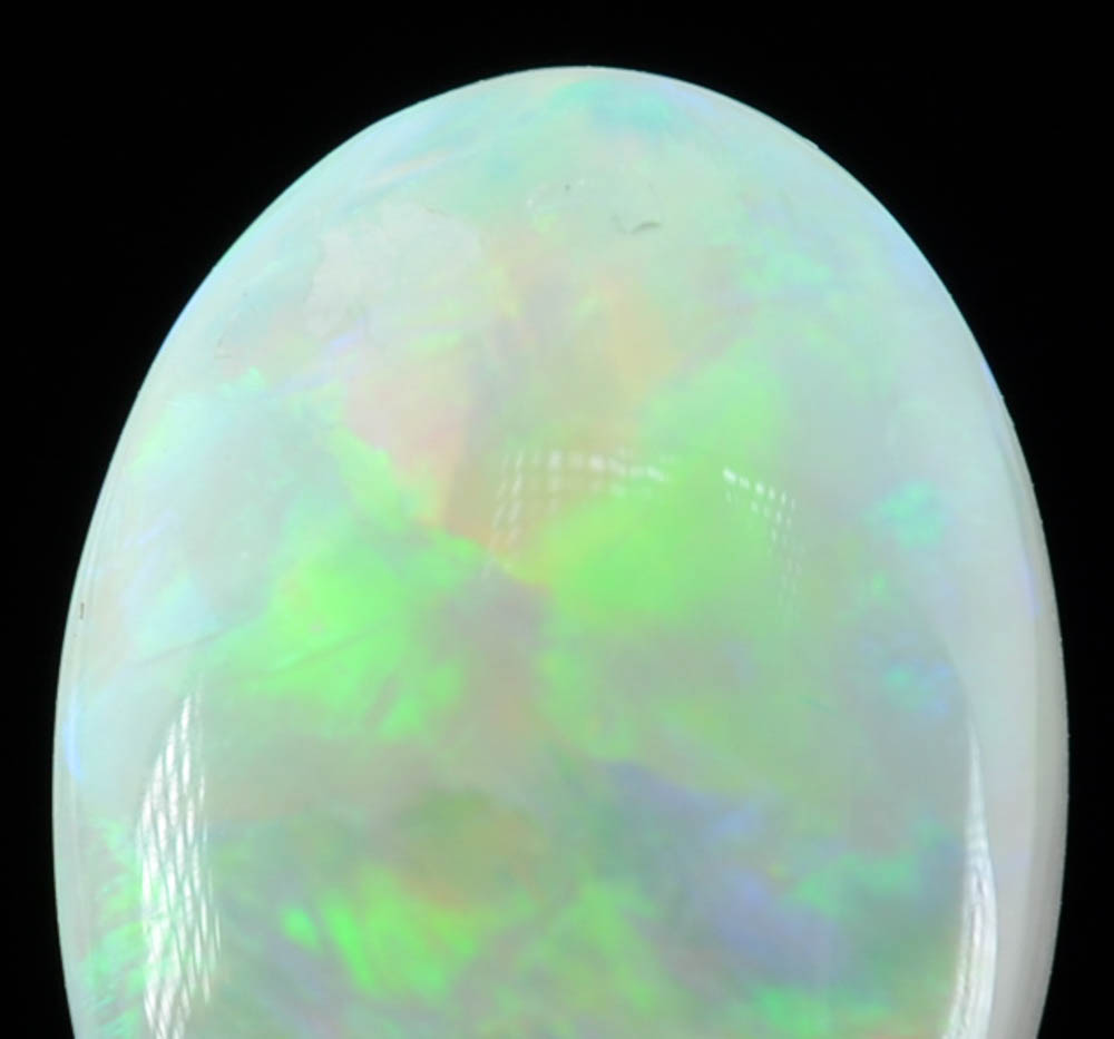 Loose 3.47 Carat Oval Opal Gemstone From The National Opal Collection