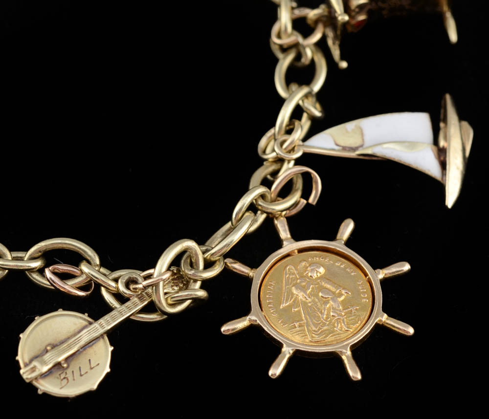 Vintage 14K Yellow Gold Charm Link Bracelet with Nine 14K Charms