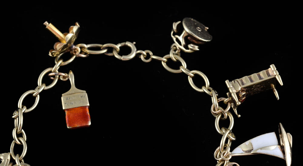 Vintage 14K Yellow Gold Charm Link Bracelet with Nine 14K Charms