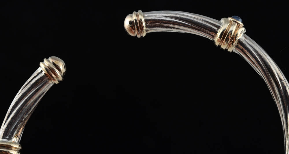 Sterling, 14K Yellow Gold and Blue Sapphire Hinged Cuff and a Sterling and 14K Blue Topaz Ring