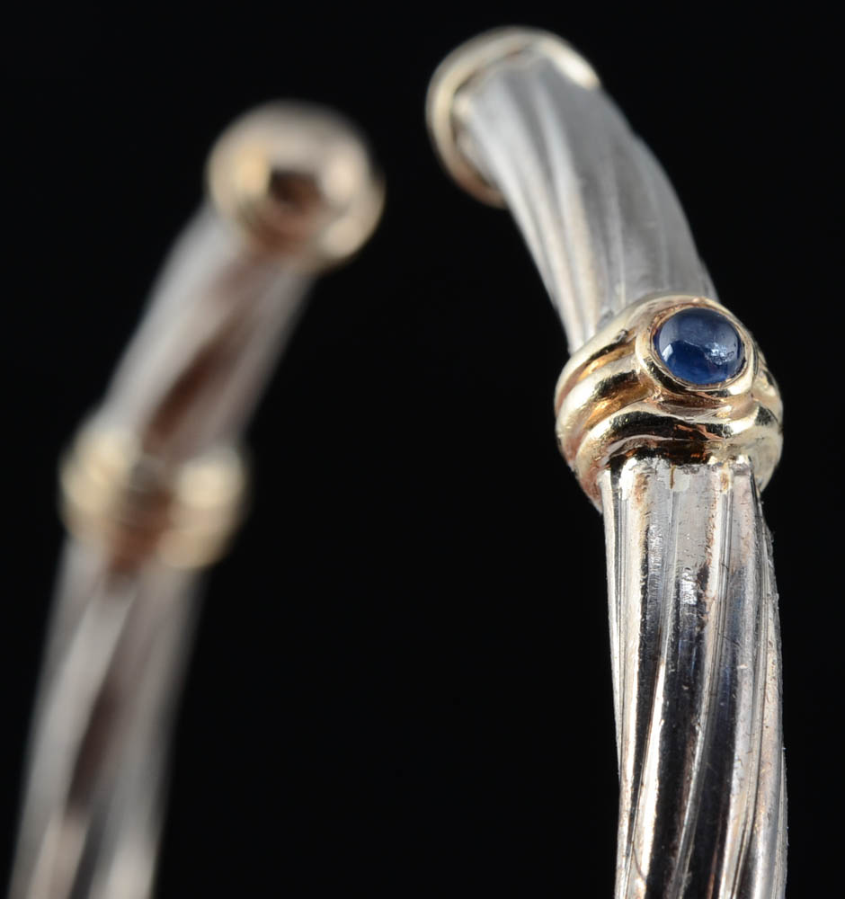 Sterling, 14K Yellow Gold and Blue Sapphire Hinged Cuff and a Sterling and 14K Blue Topaz Ring