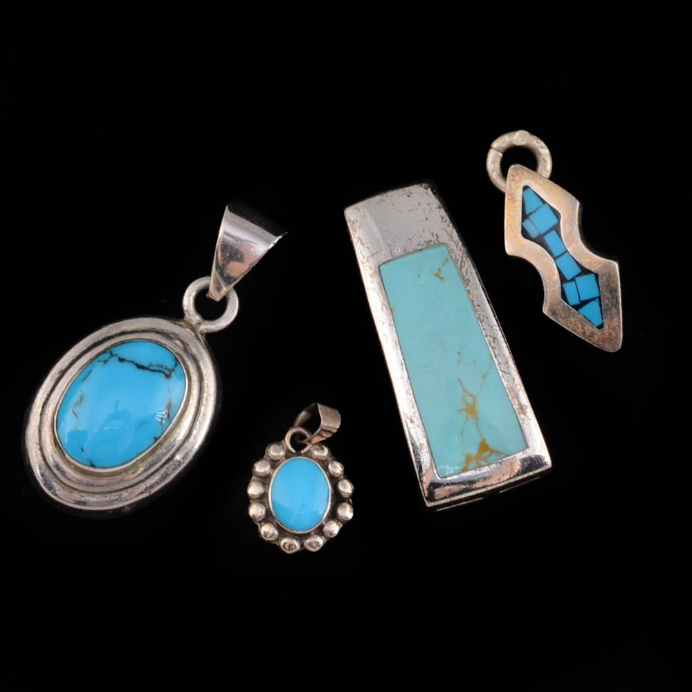 Four Southwestern Sterling Silver Pendants