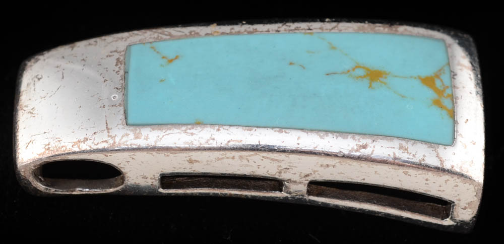 Four Southwestern Sterling Silver Pendants