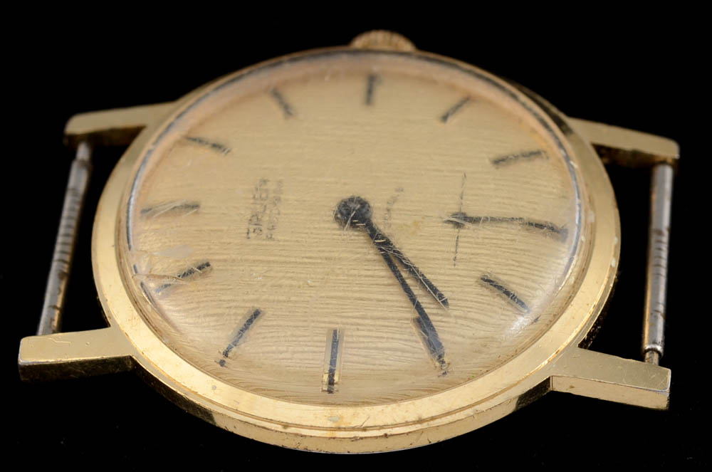 Five Watches and a Watch Face