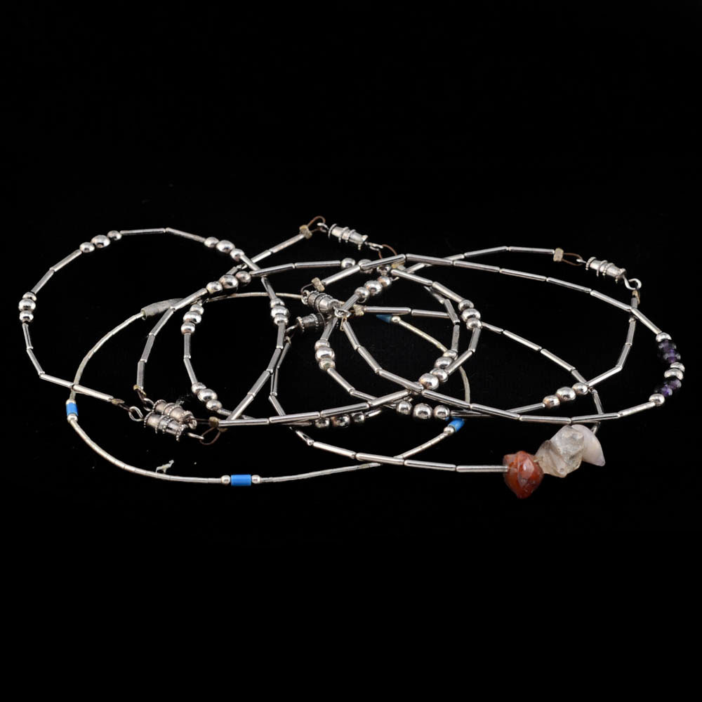 Seven Unmarked Silvertone Beaded Bracelets