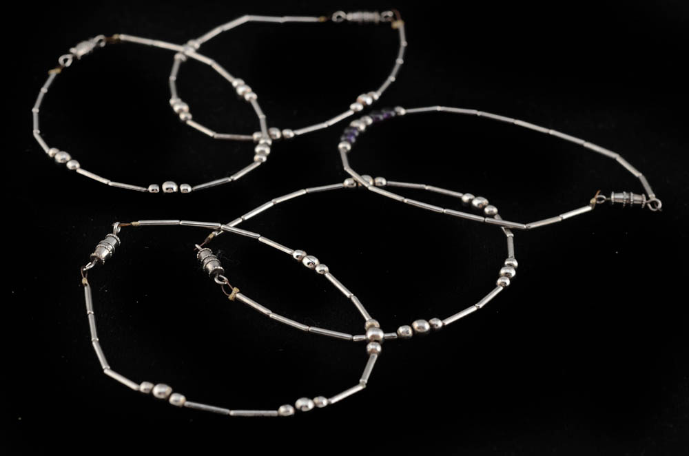 Seven Unmarked Silvertone Beaded Bracelets
