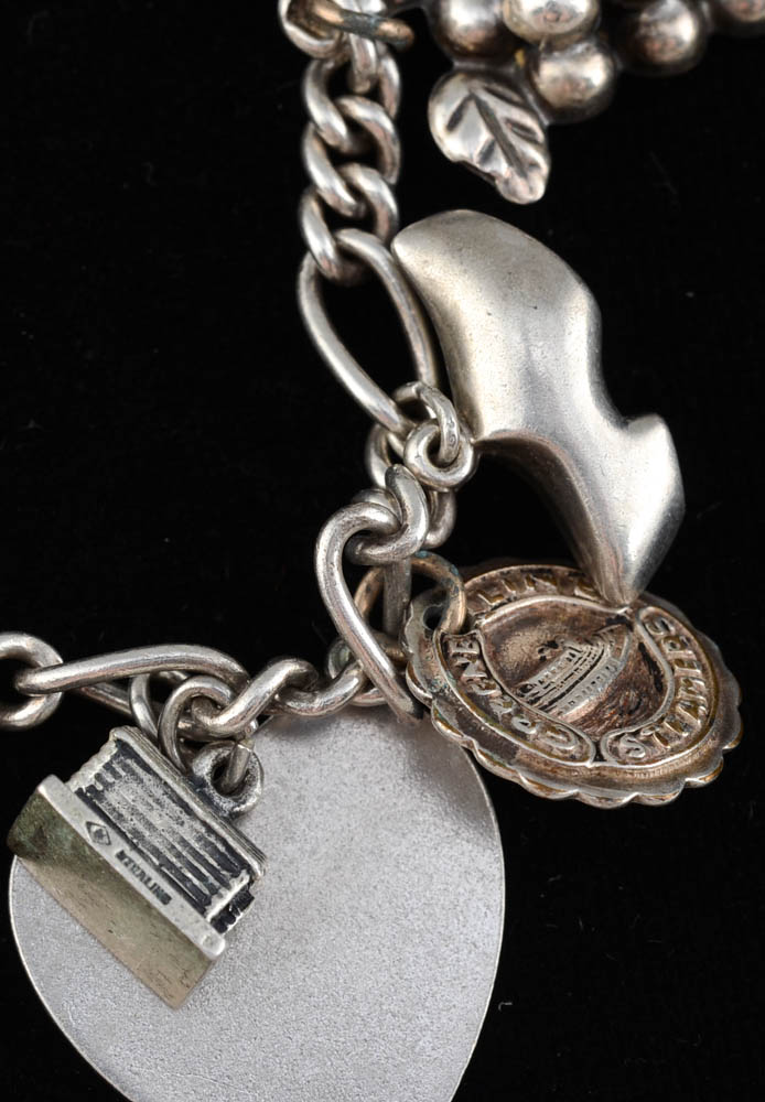 Sterling Charm Bracelet Including a Stuart Nye Dogwood Flower