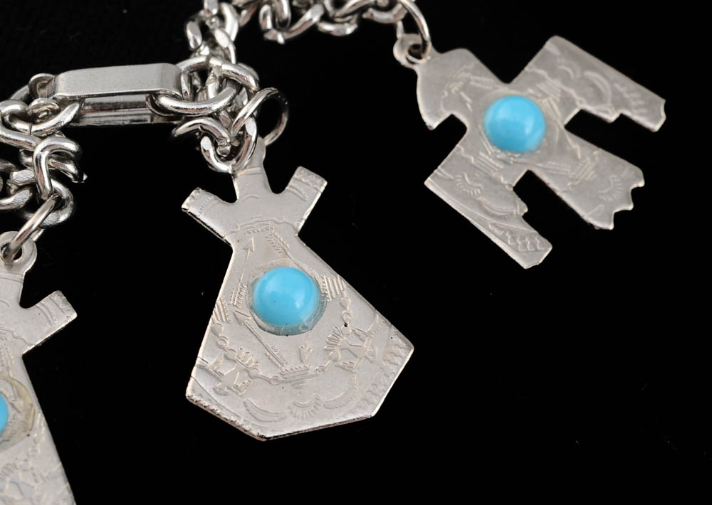 Two Charm Bracelets, Including Sterling Silver