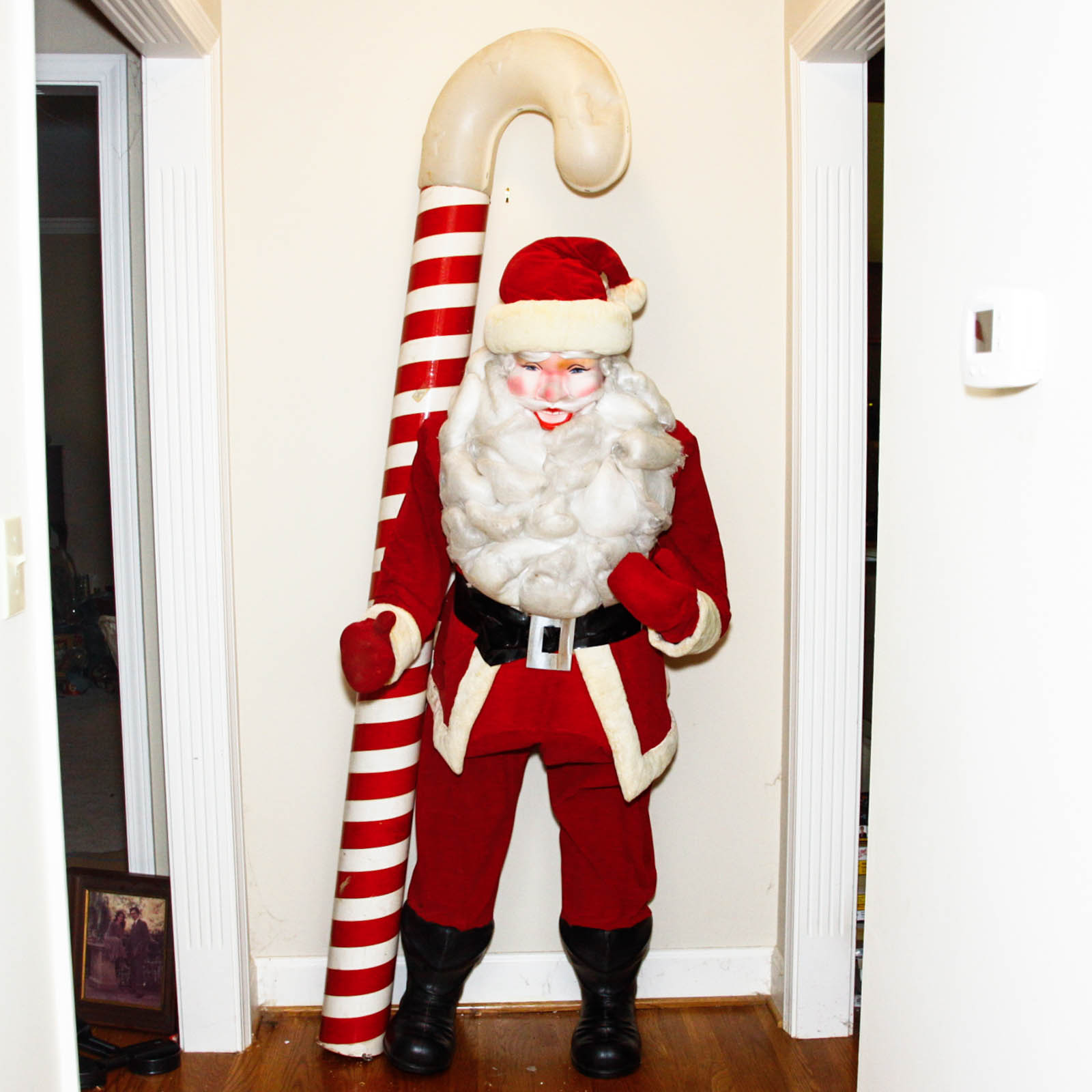 Life-Size Santa Claus and Extra-Large Candy Cane
