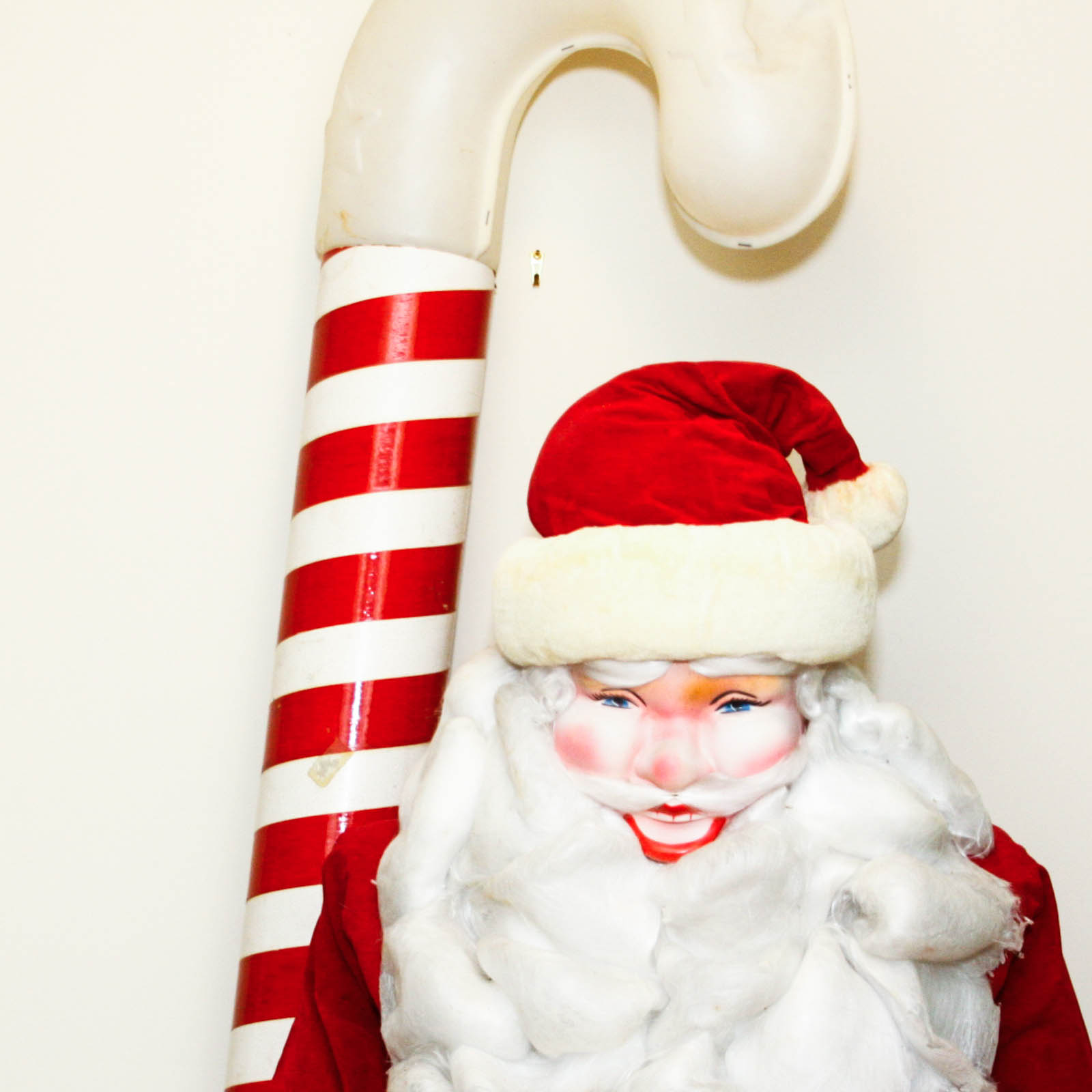 Life-Size Santa Claus and Extra-Large Candy Cane