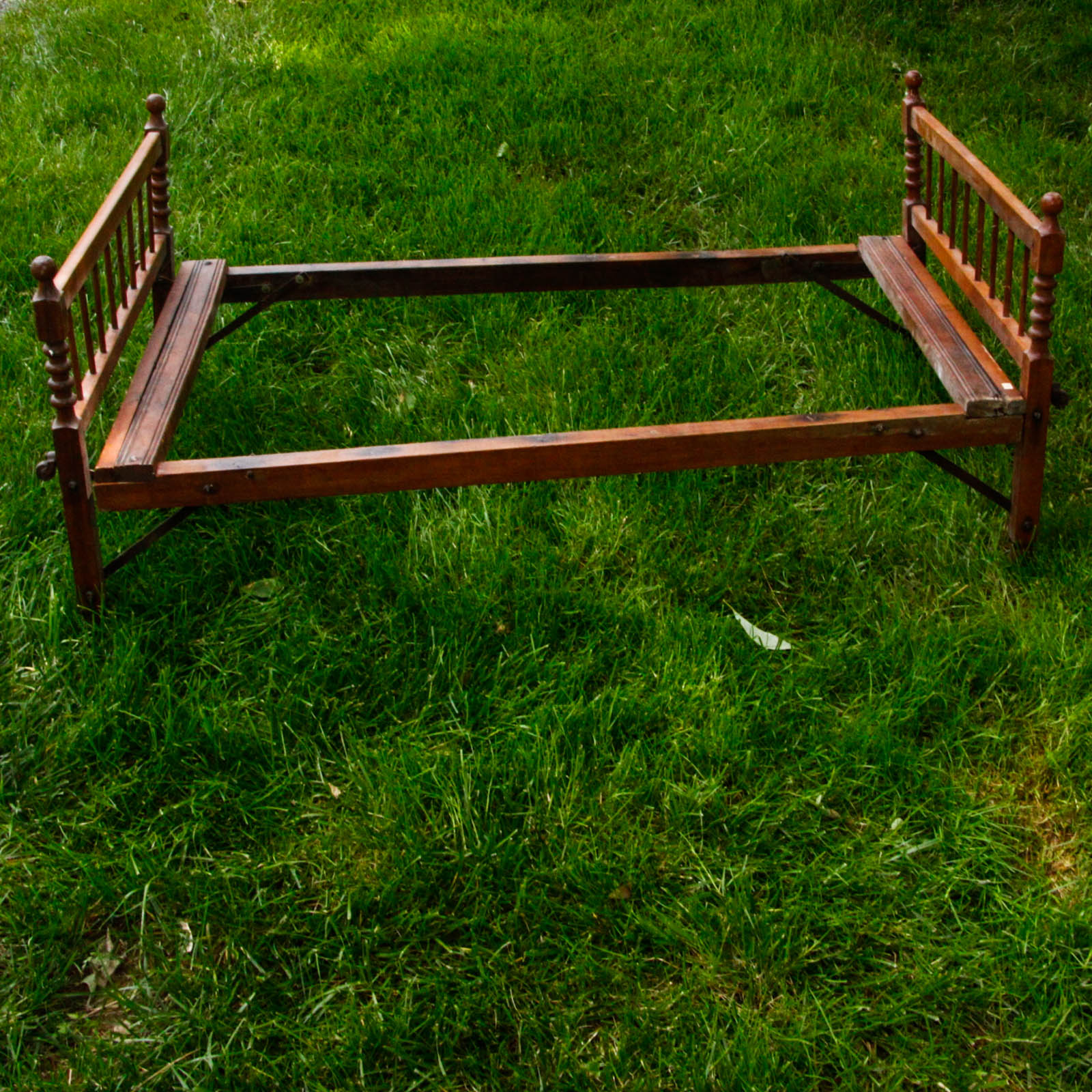 Collapsible Walnut Stained Children's Bed