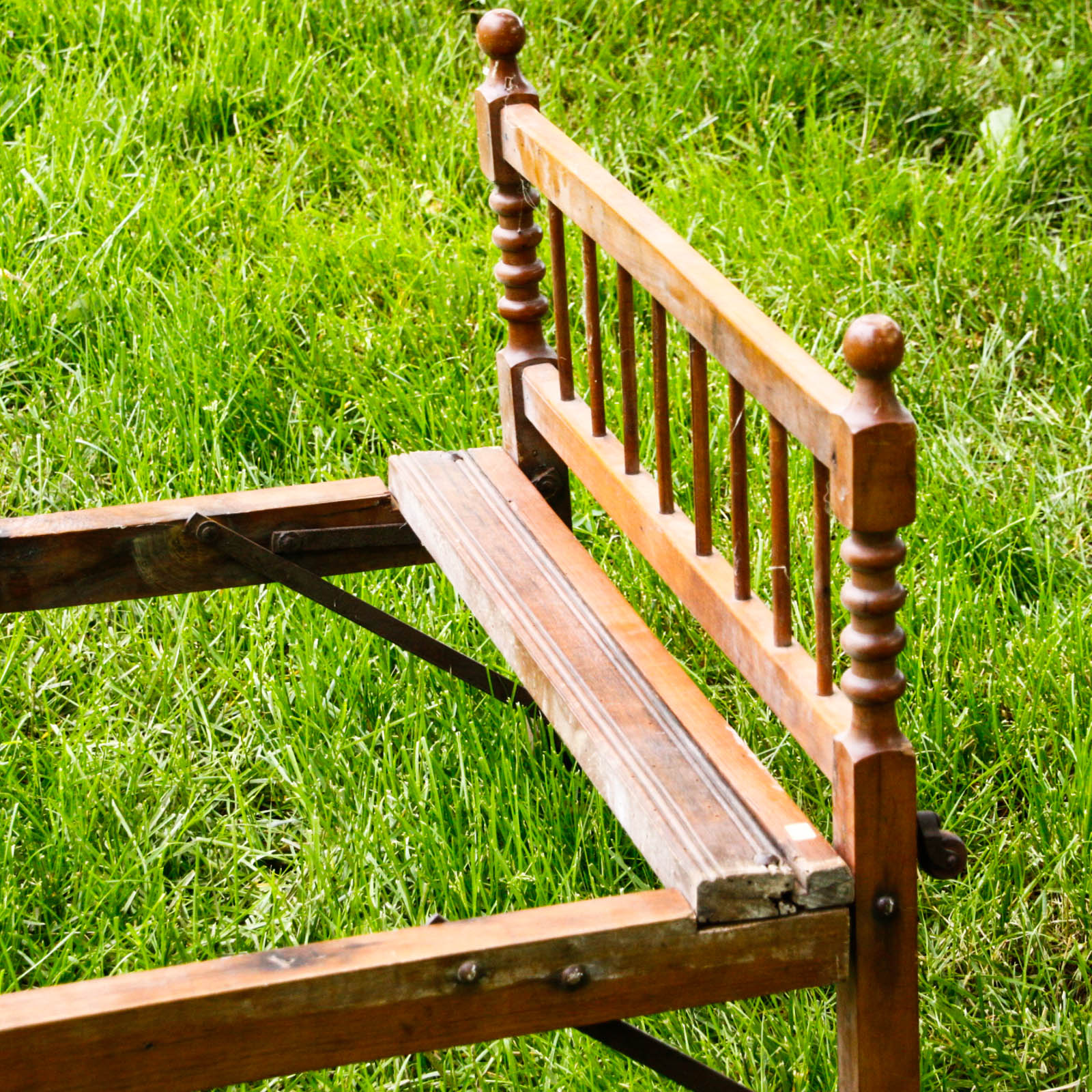 Collapsible Walnut Stained Children's Bed