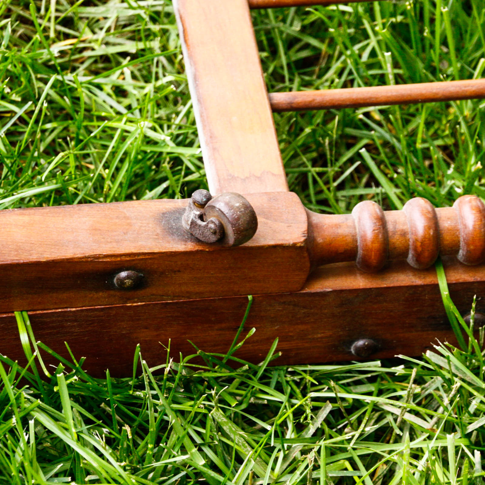 Collapsible Walnut Stained Children's Bed