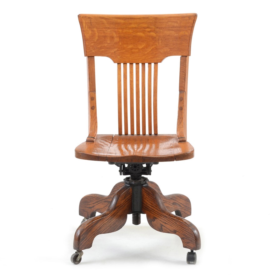 Antique Oak Rolling Banker's Style Chair