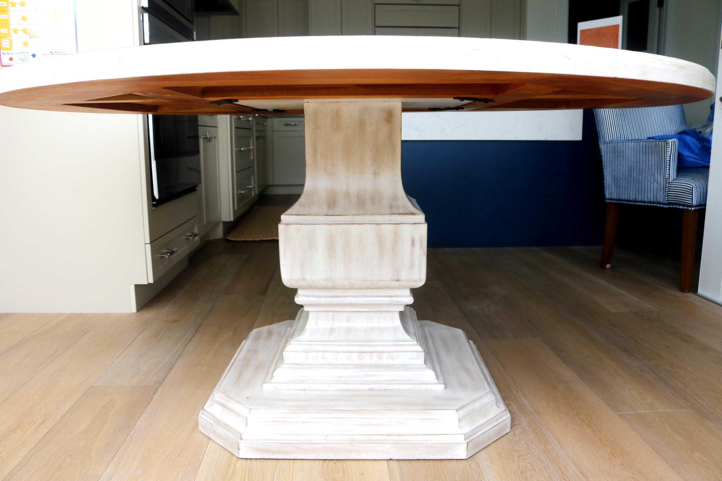 60" Round Dining Table with a Pedestal Base