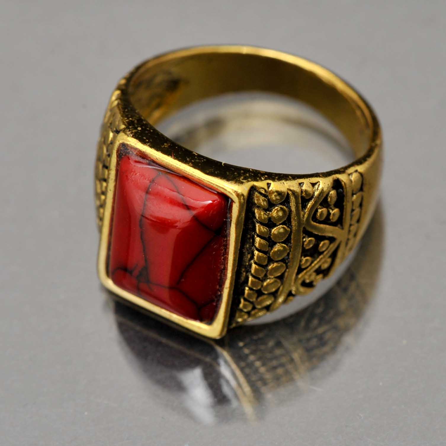 Gold-Tone Costume Ring with Red Synthetic Stone