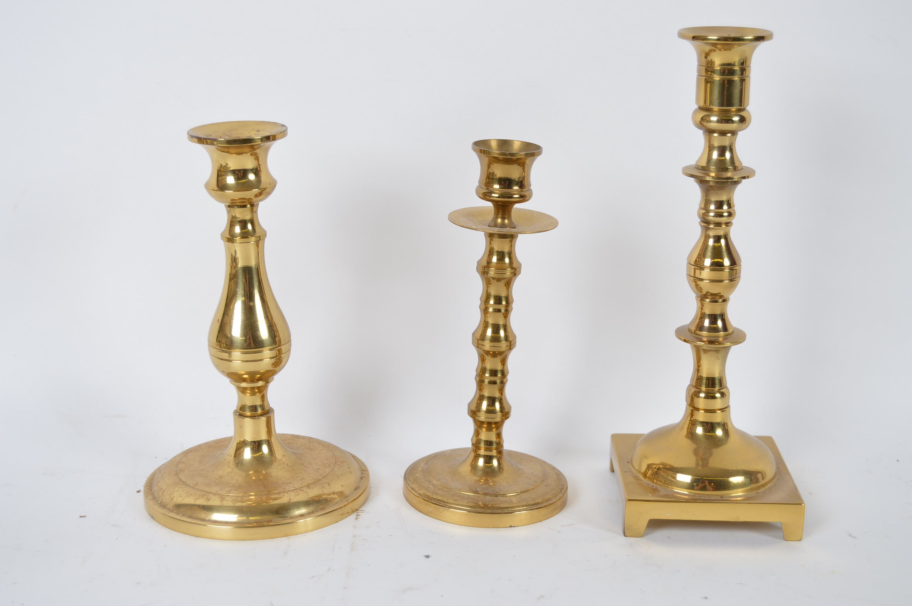Assortment of Brass Candlesticks and Decor