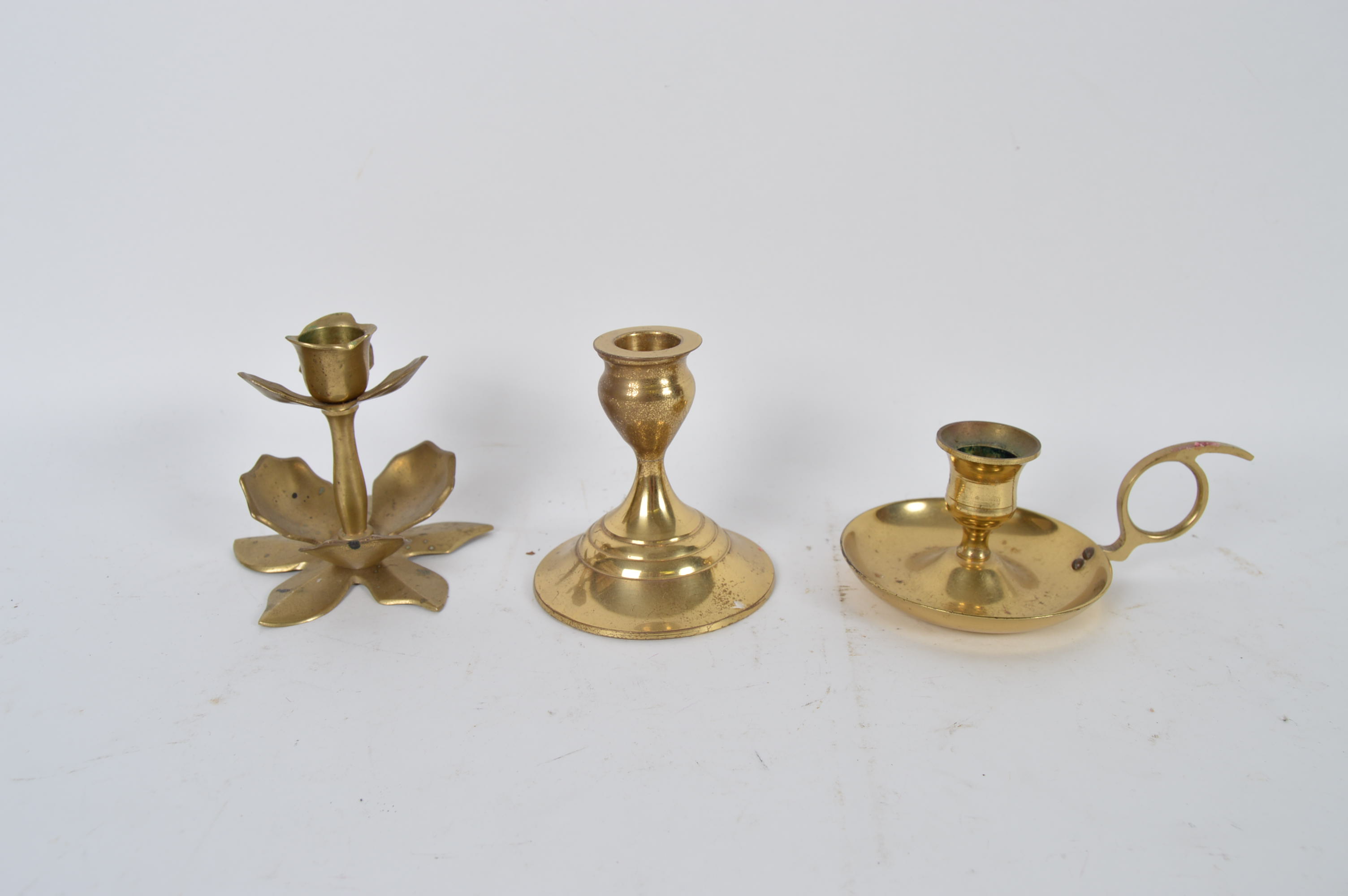 Assortment of Brass Candlesticks and Decor