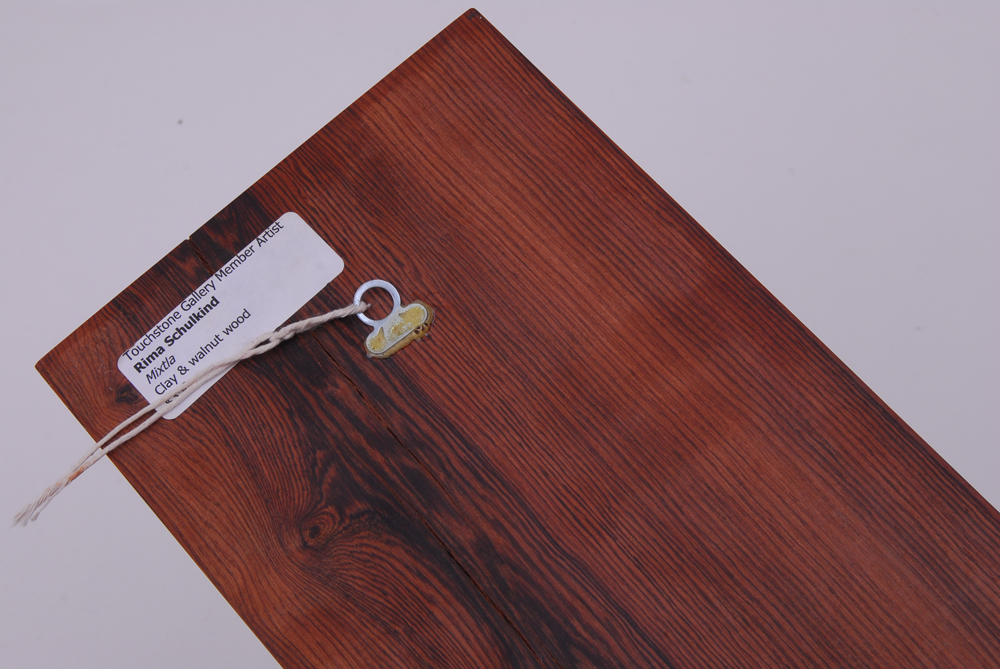 Pair of Rima Schulkind Clay Sculptures