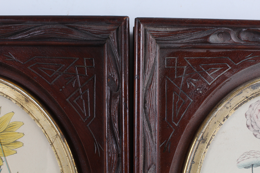 Pair of Floral Lithographs with Ornately Carved Wooden Frames