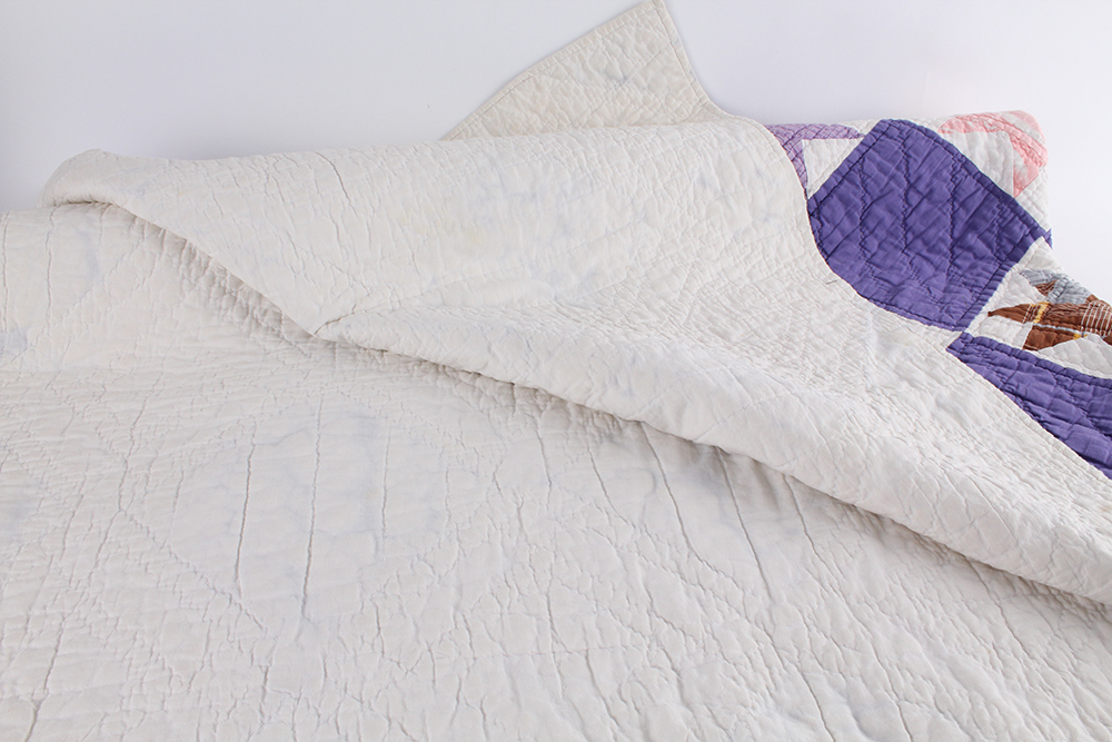 Purple Block Hand Sewn Quilt with Starflower Pattern