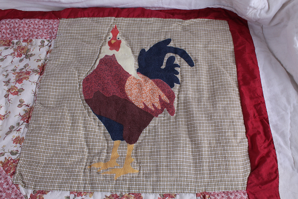 Two Hand Sewn Quilts with Large Central Motifs