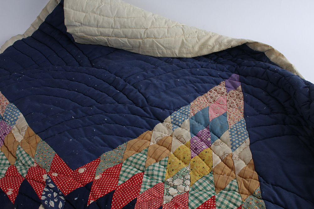 Two Hand Sewn Quilts with Large Central Motifs