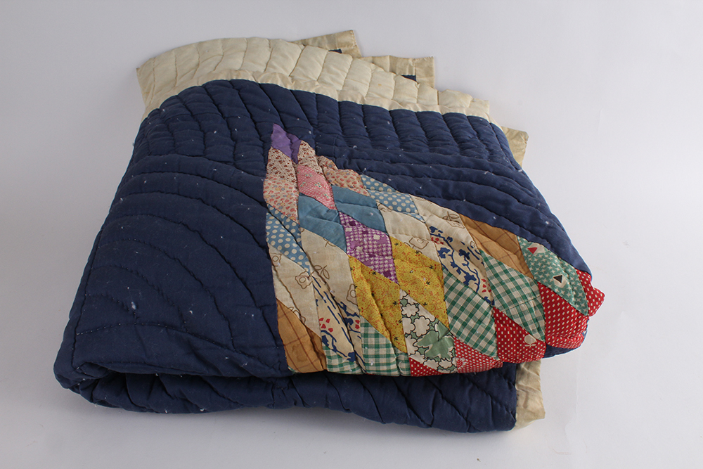 Two Hand Sewn Quilts with Large Central Motifs