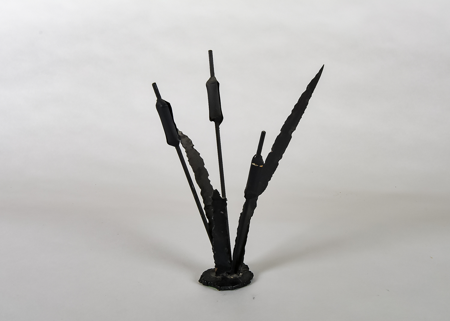 Metal Cattaiil Sculpture