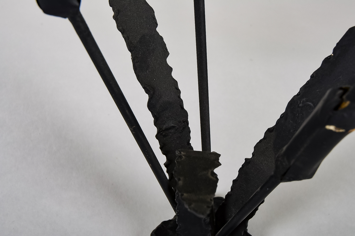 Metal Cattaiil Sculpture