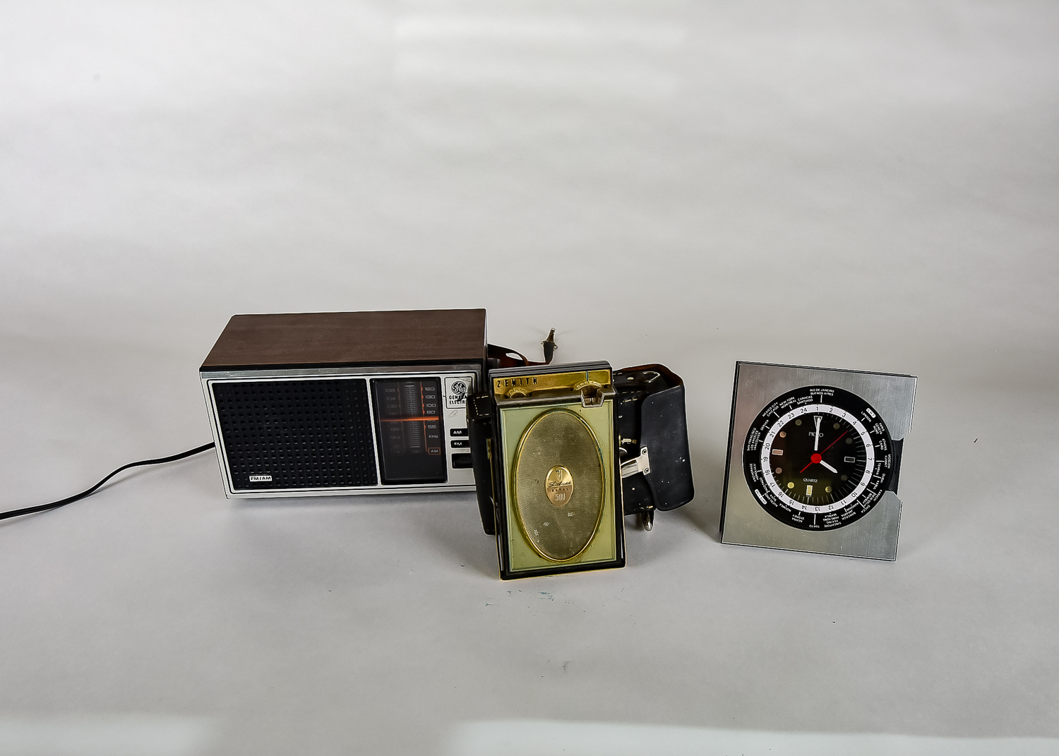 Collection of Vintage Radios and Clock featuring Zenith Deluxe Royal 500h