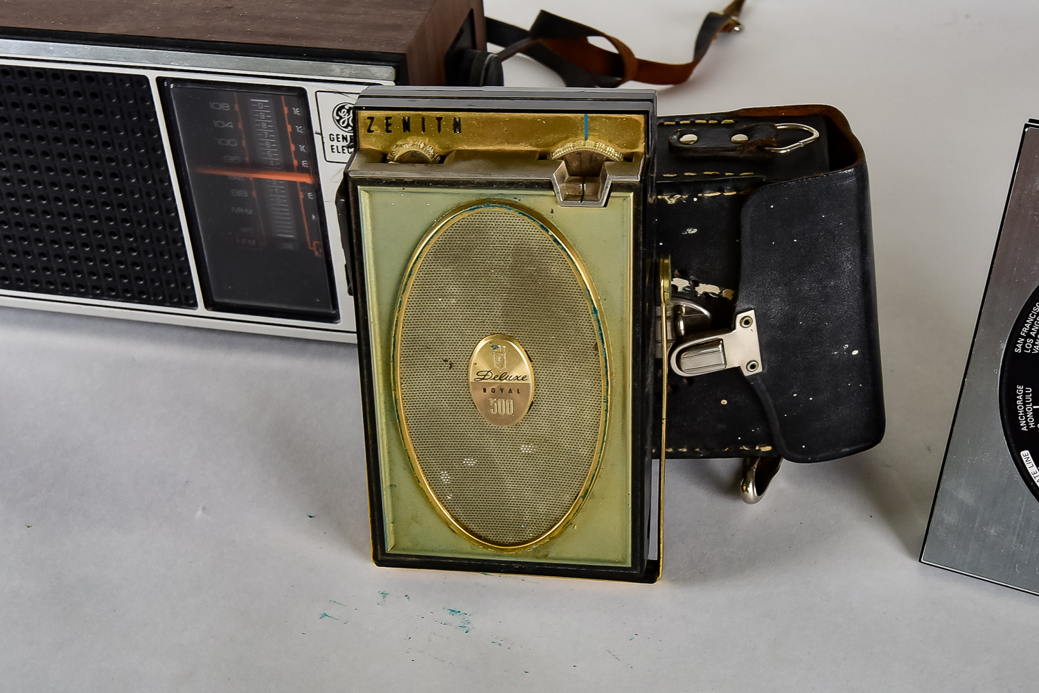 Collection of Vintage Radios and Clock featuring Zenith Deluxe Royal 500h