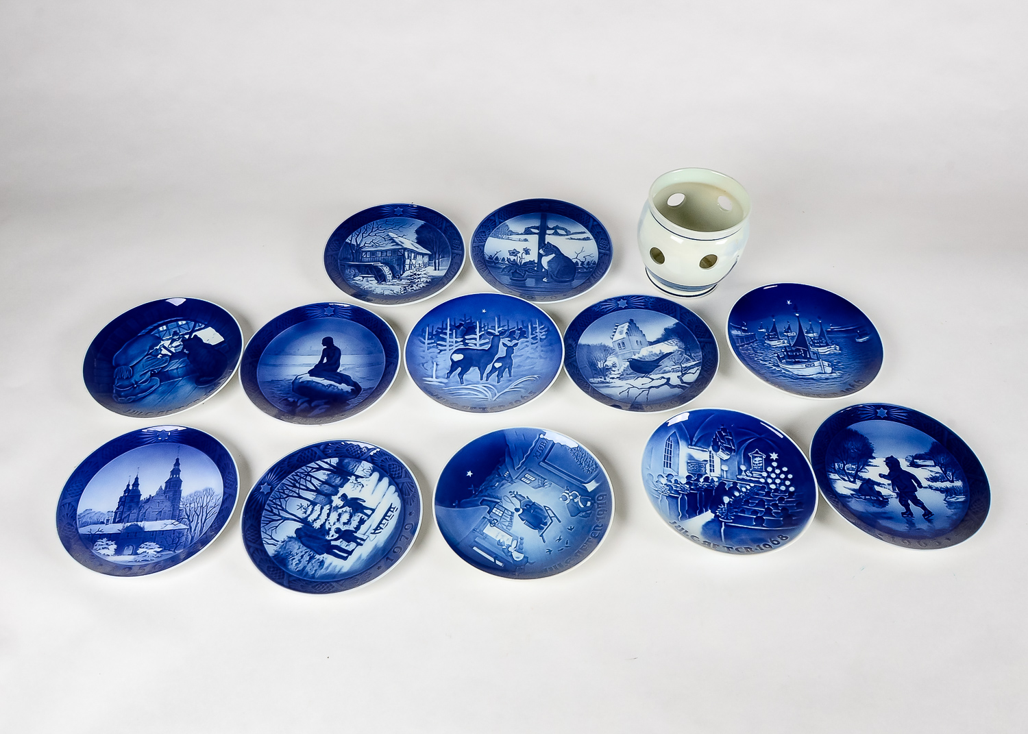Set of Blue Porcelain Decorative Plates and a Delft Planter