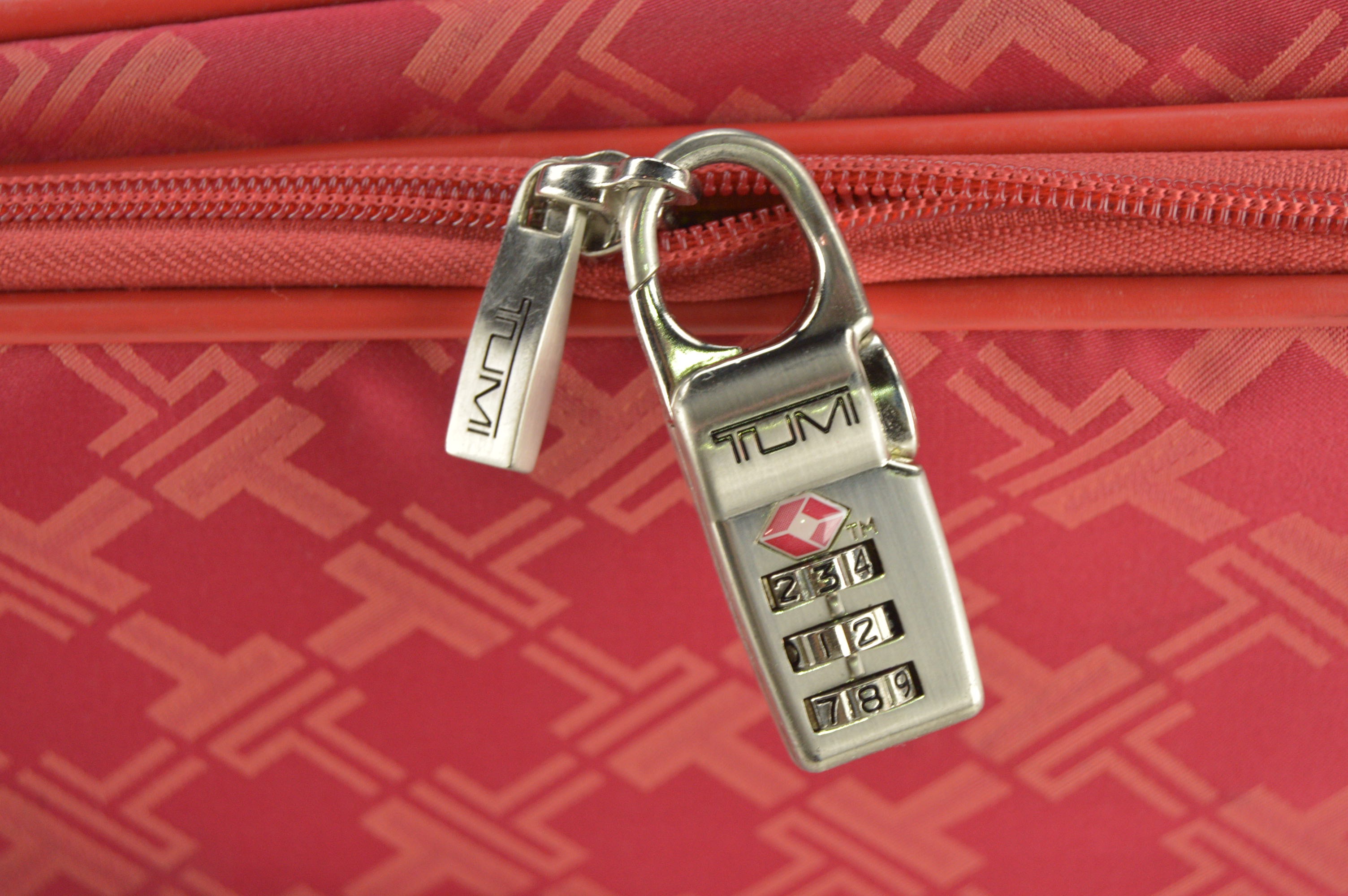 Tumi Small Red Rolling Suitcase